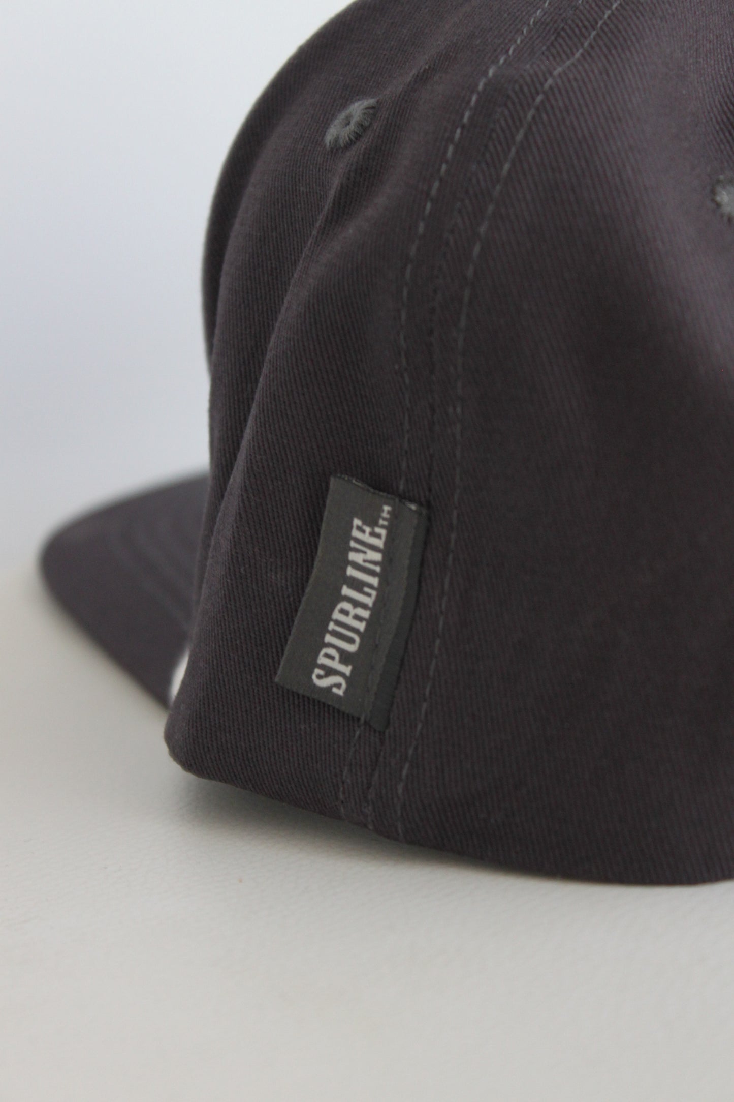 FRONTIER CAP